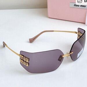 Miu Miu Sunglasses with Purple Lenses and Gold Details